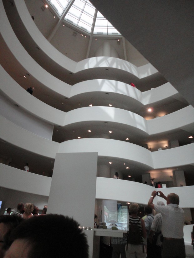 The view of the interior of the Solomon R. Guggenheim Museum on a busy New York summer day. The Guggenheim was designed by Frank Lloyd Wright, and is one of the most widely recognized pieces of architecture in the 20th century. The art museum is located in New York City. (Peter Baugh)