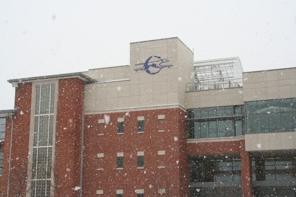 Snow falls on the Clayton High School Quad
