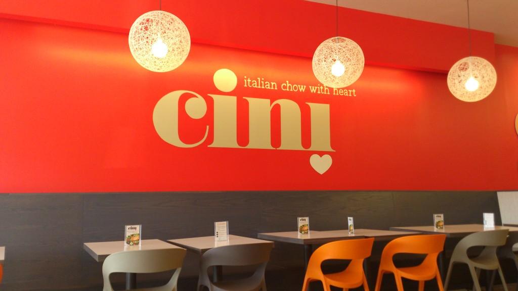 Interior of Cini - Logo