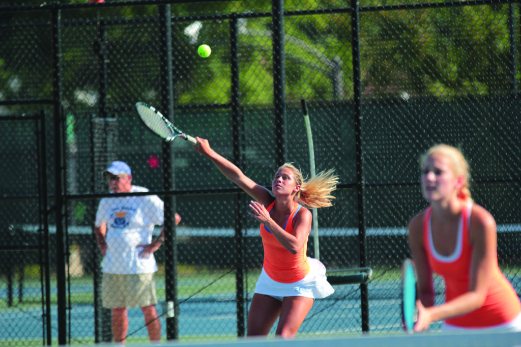 Cassity playing with her partner, Cameron Freeman. 