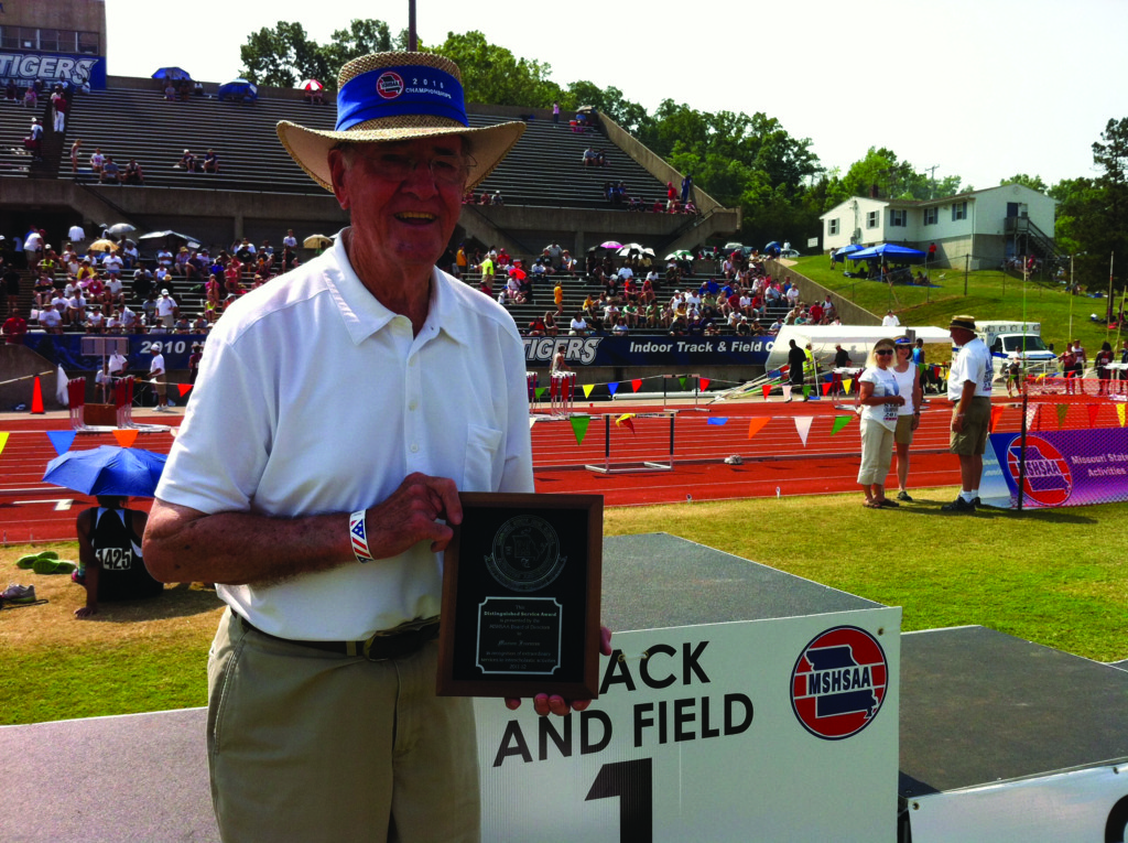 Freeman with a Distinguished Service Award. (Freeman Family) 