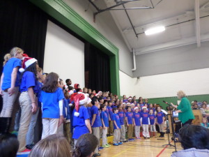 The Glenridge Chorus sings "Angels We Have Heard On High" at the annually held Holiday Sing-Along in the Glenridge gymnasium.