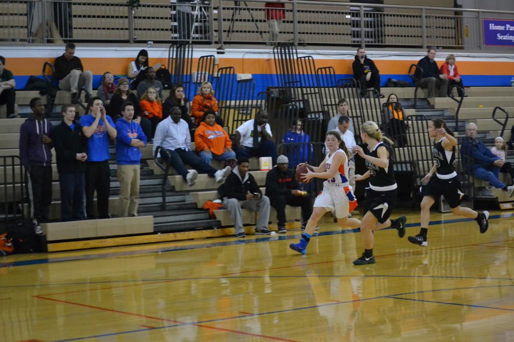 Senior Revees Oyster takes it down the floor in a game again Brentwood at Stuber Gym. 