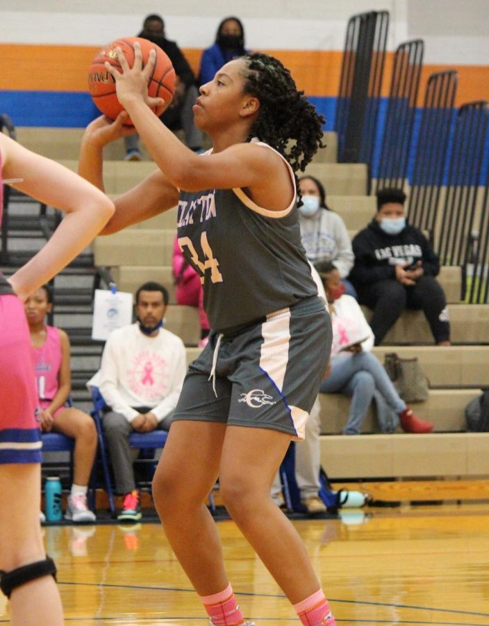 Brooklyn Pierce shoots a free throw at a basketball game versus Ladue. 