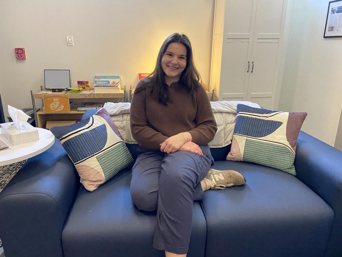 Wellness Outreach Specialist Grace Sullentrup enjoys the couches and comfortable seating areas in the Wellness Center. She usually keeps the overhead lights off, preferring to light the space with lamps. 