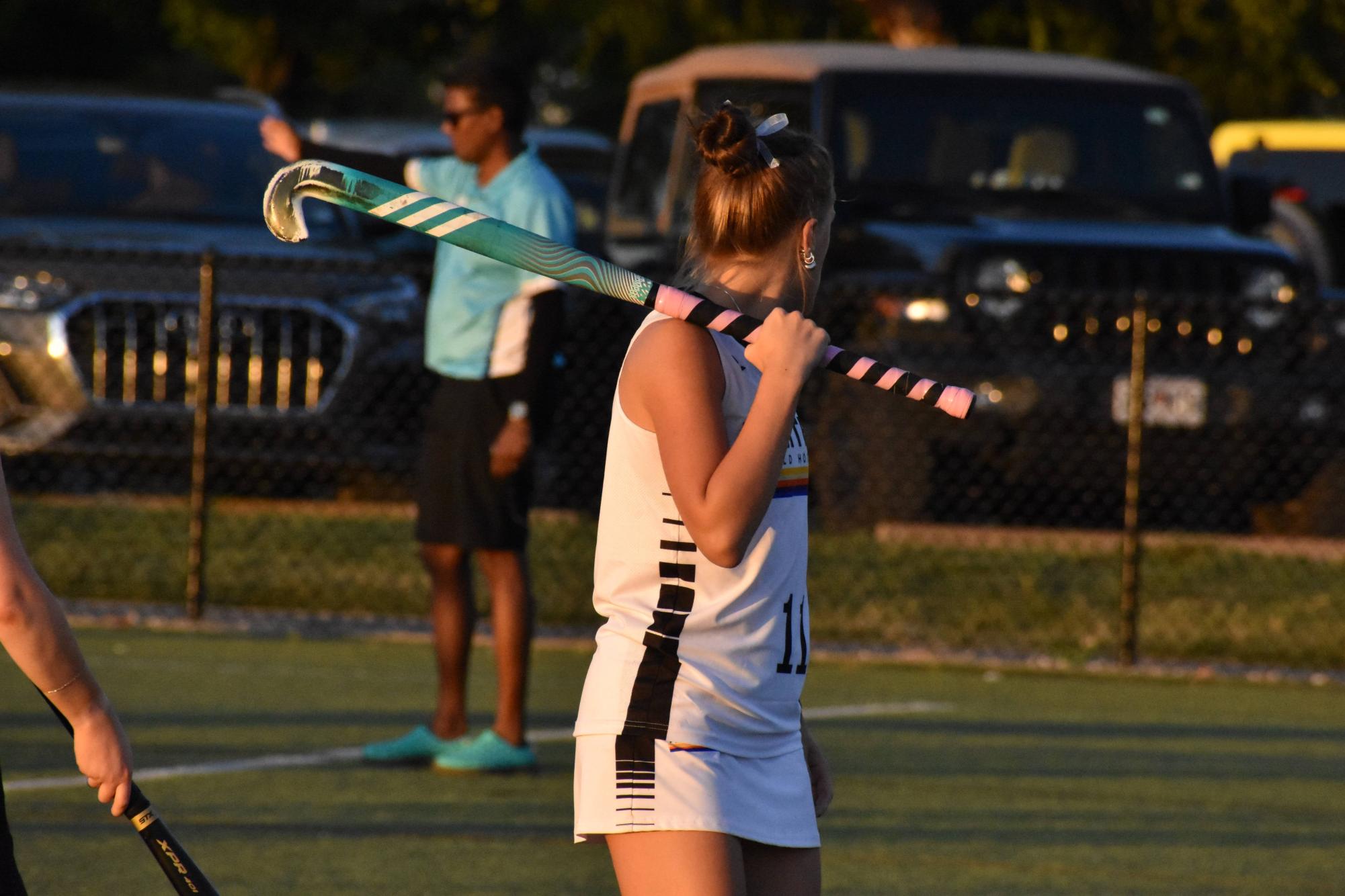 CHS senior, Maddie Meyers, watches a corner on United’s defense. She shifts into a ready stance, preparing to sprint down to the 25-yard line. Photo courtesy of Calli Moske