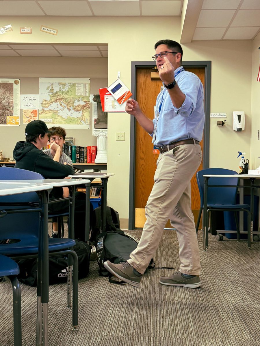 Latin teacher Matthew Crutchfield teaches his first period Latin II class. “‘Work hard, have fun,’ is my advice for most of life. Try to do your best, and if you have questions, ask early, ask often,” Crutchfield said. 