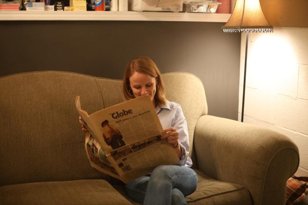 Theater Director Mallory Duncan holds the 2004 Globe issue, with her picture on the cover as a senior. Duncan played a central role in the cover story, where her creativity and hard work behind the new Student Run Musical were showcased.