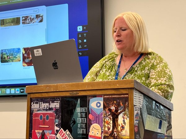 
Instructional Coach Donna Archer leads the faculty meeting Monday, Sept. 16, through an exercise where she had teachers put a GIF to describe their favorite season on the presentation. 