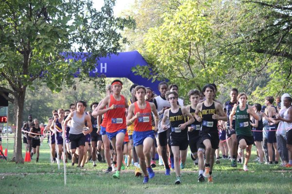 At the start of the Bishop-DuBourg
Invitational, in Wilmore Park, with
juniors Karl Barthel and Dante Zou
leading the way.