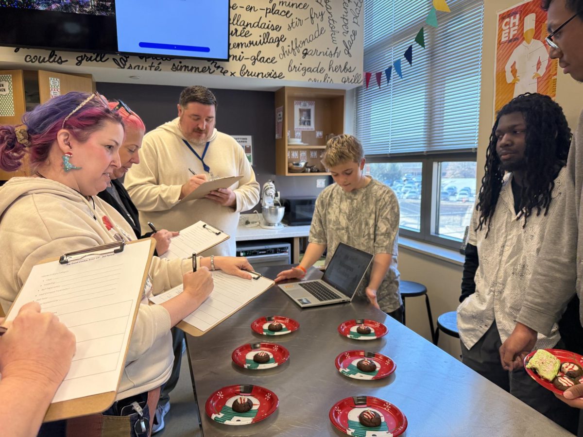 Seniors Murphy Nayler and I’Ron Bell present for their final in culinary arts to a panel of judges made up of staff members.