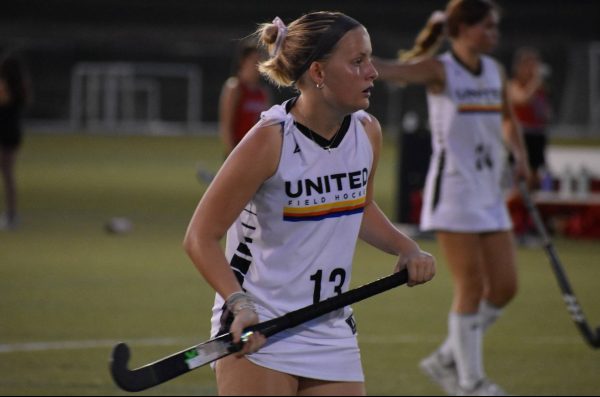 JV team member Annabelle Olsen waits for the ball during an away game. Olsen was a starting offense player and the JV captain. "I wanted to always be able to instruct my team if needed, but also be aware of their game plan," Olsen said. 