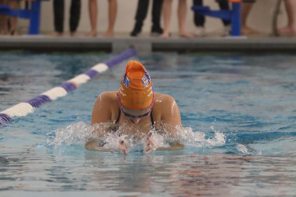 Sophomore Ema Stojicevic swims breaststroke at the girls swim and dive team’s home opener against Webster. The team won 109-76. “I love how supportive everyone is. Being on the team is like having a second family,” Stojicevic said.