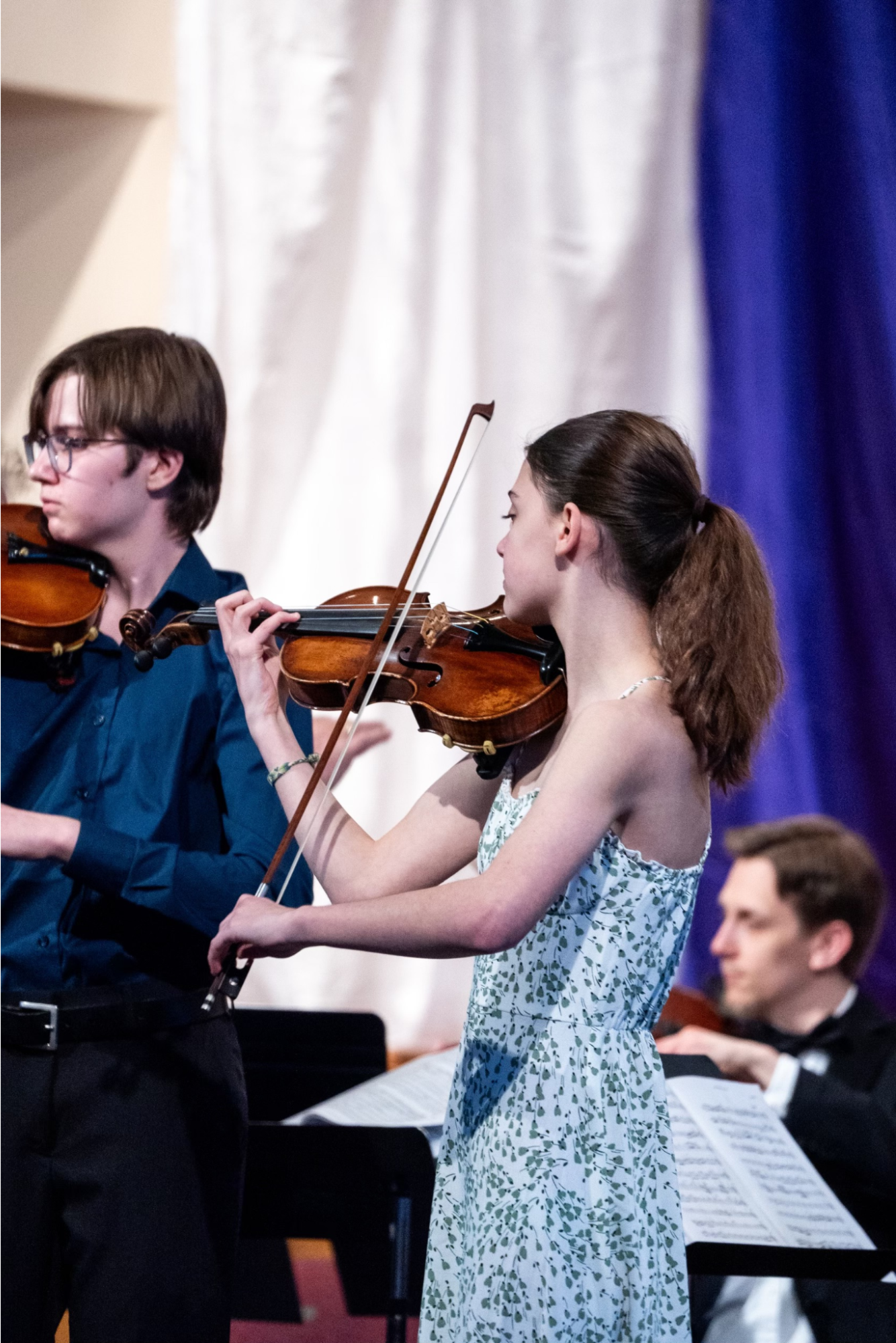 Zoe Baldwin plays at the Odyssey pre-collegiate concerto competition. At the winners competition, Baldwin played the Bach Triple. "It was fun to play with my friends in a triple [violin] concerto," Baldwin said. Photo Courtesy of Zoe Baldwin