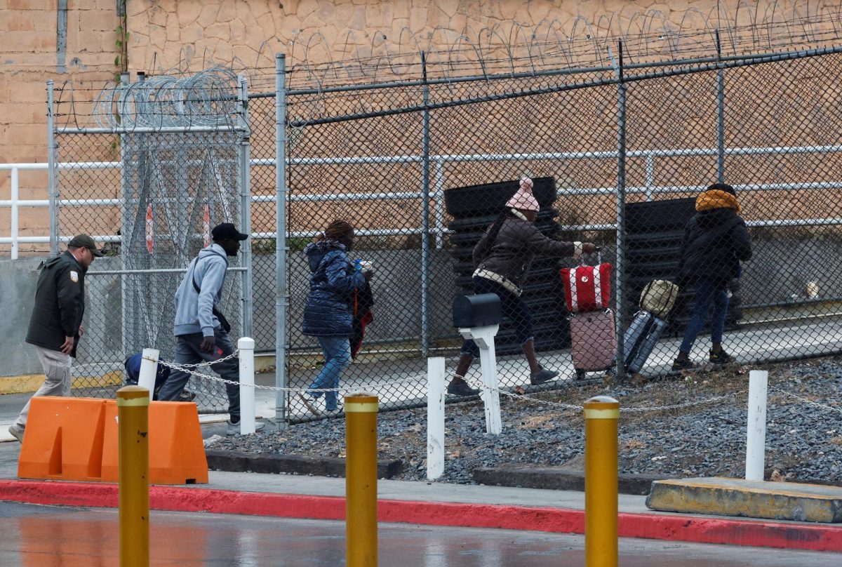 Asylum seekers arrive at the B and M Brownsville-Matamoros International Bridge, to attend their appointment with the U.S. Customs and Border Protection (CBP), on the day of the inauguration of U.S. President-elect Donald Trump, in Matamoros, Mexico Jan. 20, 2025.