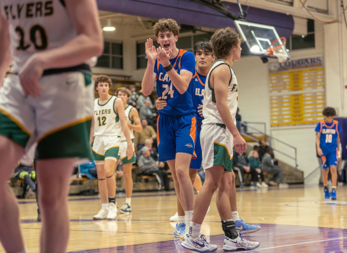 Senior Eli Fauss celebrates after a three-point shot is scored against Lindbergh High School. Fauss achieved 1,000 career points in the second quarter of the boy’s basketball game against Eureka on Friday, Jan. 17. “I’m super excited about hitting 1,000 career points and it is a great individual achievement that represents the hard work I have put in over my career,” Fauss said. “To be the sixth in Clayton history it is also exciting to be put in an exclusive club of the best Clayton players. More importantly the team and coaches have put me in a position to be successful on the court and I am excited to continue the great season we have begun.”