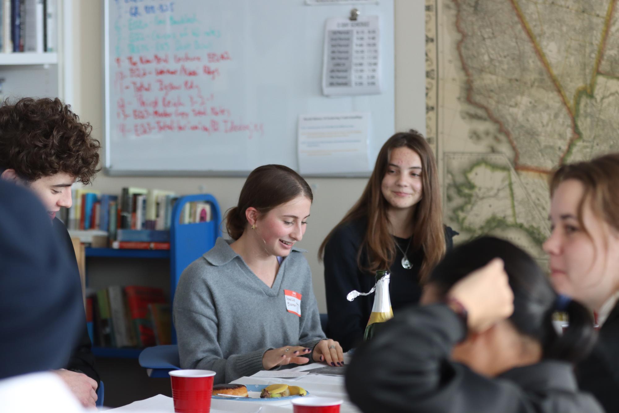 AP US History students perform their annual "Reformers Dinner Party" in Josh Meyers' 6th hour class. This is just one example of the immersive ways teachers in the humanities are working to bring back engagement and focus on these subjects. 