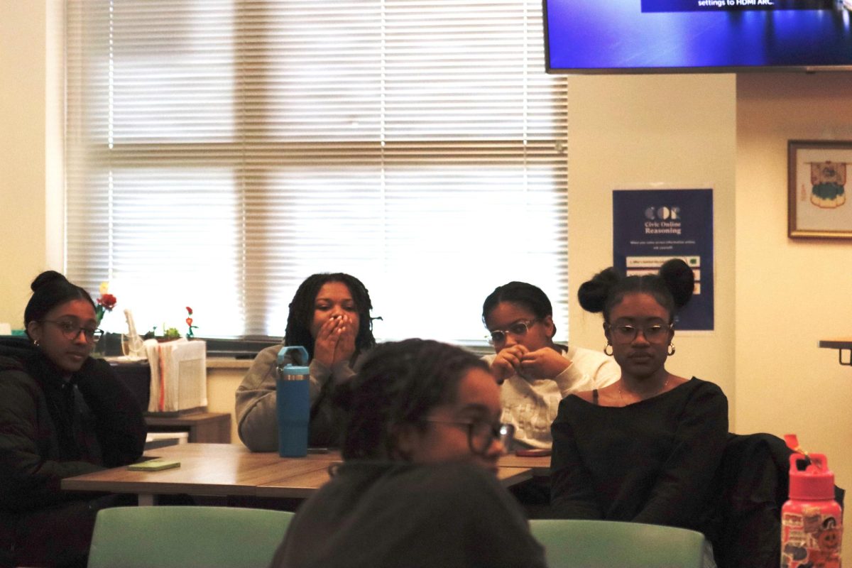 Seniors Gabriella Williams, Lauren Young, Brooke Lytle and Maya Nussinov attend the Black Students in AP (BSAP) meeting.