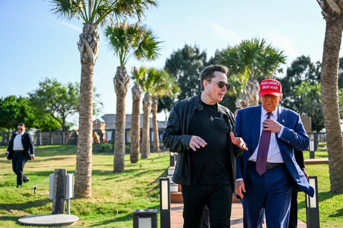 Elon Musk greets U.S. President-elect Donald Trump as he arrives to attend a viewing of the launch of the sixth test flight of the SpaceX Starship rocket in Brownsville, Texas, U.S., November 19, 2024.