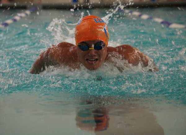 Austin Chu swims in the dual meet against Ladue on Sept. 19, resulting in a school victory.